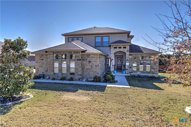 view of front of home with a front lawn