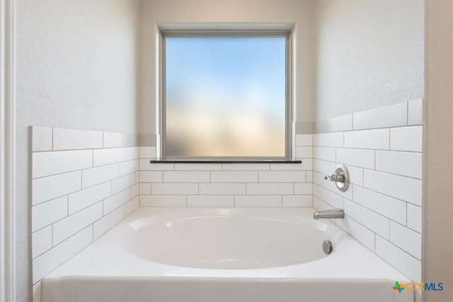 bathroom featuring a bathtub