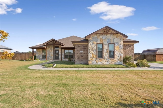 view of front of property with a front lawn