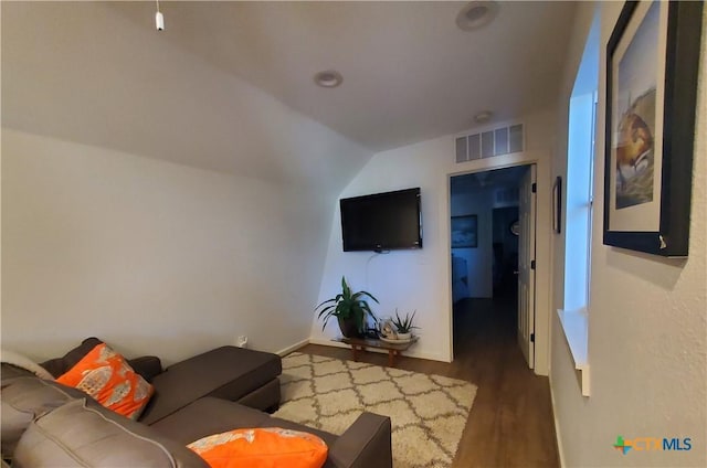 404 S 13th St, Seadrift, TX 77983 - living area featuring wood finished floors and lofted ceiling