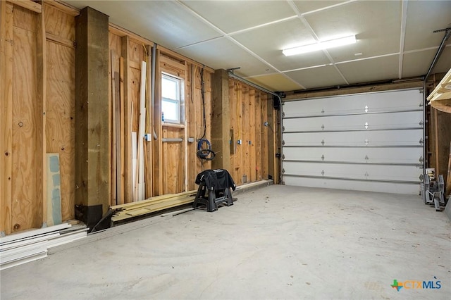 121 Bufflehead Ln, Rockport, TX 78382 - garage featuring wood walls