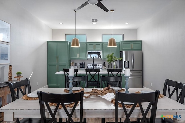 121 Bufflehead Ln, Rockport, TX 78382 - dining room featuring ceiling fan and recessed lighting
