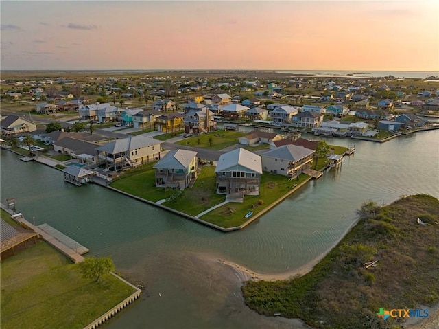 121 Bufflehead Ln, Rockport, TX 78382 - aerial perspective of suburban area featuring a large body of water