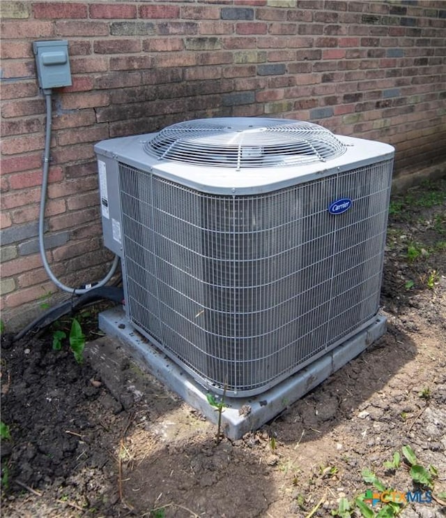 1906 N 60th St, Killeen, TX 76543 - exterior view of cooling unit and brick siding