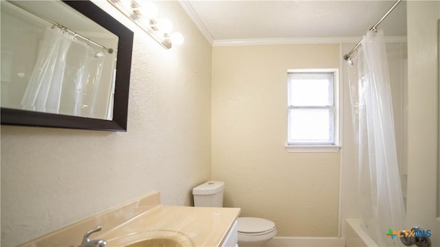 1906 N 60th St, Killeen, TX 76543 - bathroom featuring toilet, ornamental molding, vanity, shower / bath combo with shower curtain, and baseboards