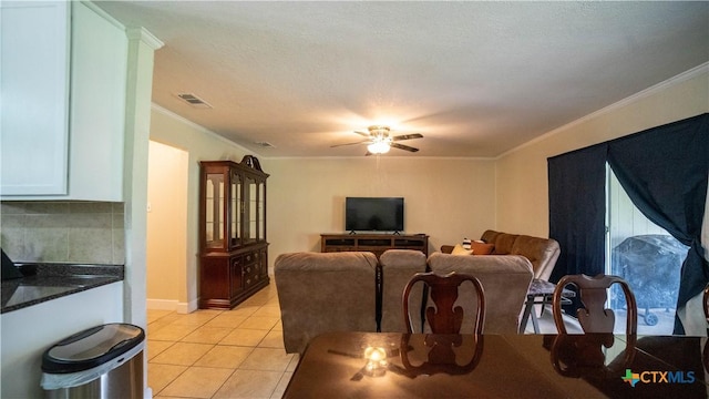 1906 N 60th St, Killeen, TX 76543 - living area featuring ornamental molding, ceiling fan, and light tile patterned floors