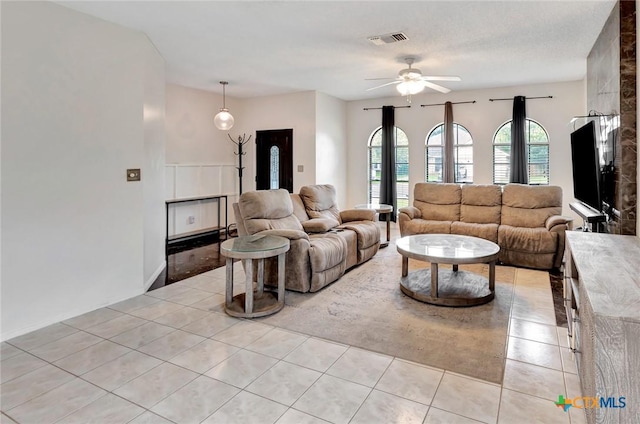 108 Bridle Ln, Victoria, TX 77904 - living area with light tile patterned floors and ceiling fan