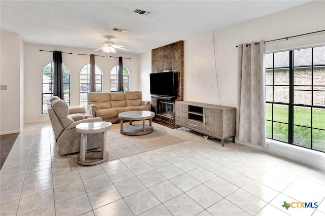 108 Bridle Ln, Victoria, TX 77904 - living room with healthy amount of natural light, ceiling fan, and light tile patterned floors