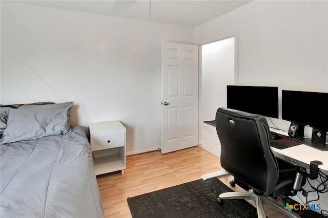 108 Bridle Ln, Victoria, TX 77904 - home office with light wood-style flooring and baseboards