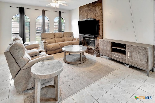 108 Bridle Ln, Victoria, TX 77904 - living area featuring light tile patterned floors and a ceiling fan