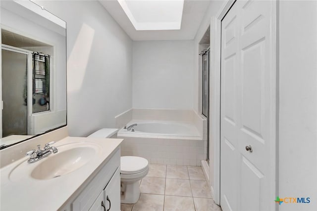 108 Bridle Ln, Victoria, TX 77904 - full bathroom with toilet, vanity, a shower stall, a bath, and tile patterned flooring