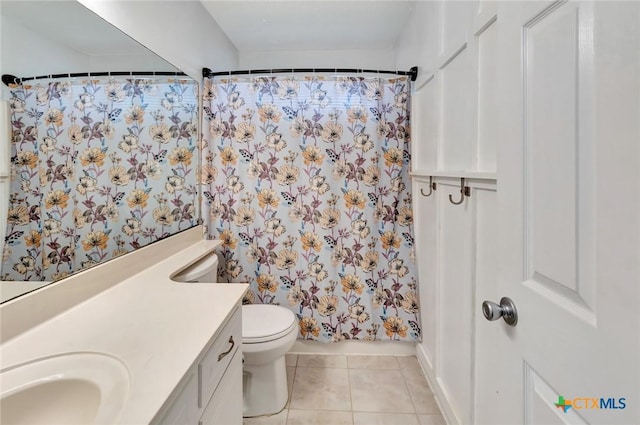 108 Bridle Ln, Victoria, TX 77904 - full bathroom featuring vanity, tile patterned flooring, and toilet