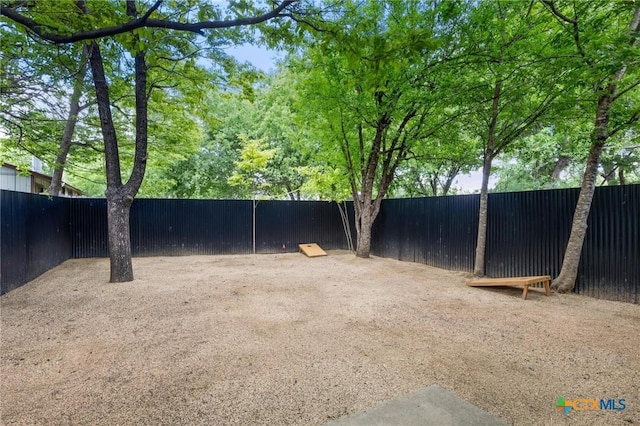 view of yard with fence