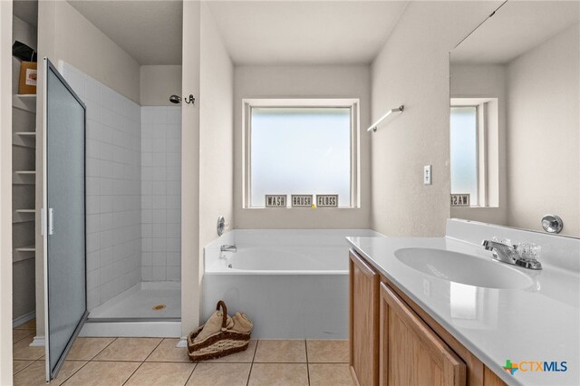 2810 Scottsdale Dr, Killeen, TX 76543 - bathroom with a stall shower, vanity, a bath, and tile patterned flooring