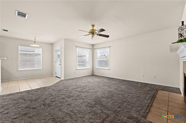 2810 Scottsdale Dr, Killeen, TX 76543 - bathroom with healthy amount of natural light, a whirlpool tub, tile patterned floors, a skylight, and a textured wall