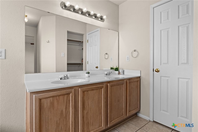 2810 Scottsdale Dr, Killeen, TX 76543 - bathroom featuring double vanity and tile patterned flooring