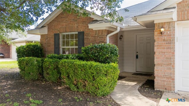 2810 Scottsdale Dr, Killeen, TX 76543 - view of front of house with brick siding, driveway, and a garage