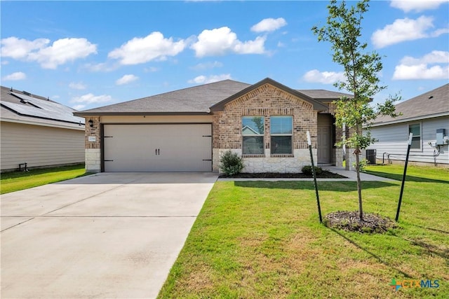 2358 Aylesbury Dr, Copperas Cove, TX 76522 - ranch-style house with brick siding, an attached garage, concrete driveway, a front lawn, and stone siding