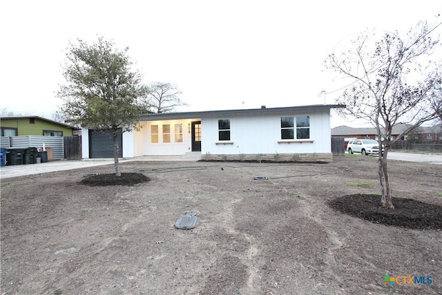 ranch-style home featuring an attached garage