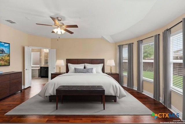 620 Ridgemeadow Dr, New Braunfels, TX 78130 - bedroom with wood finished floors, ensuite bath, and ceiling fan