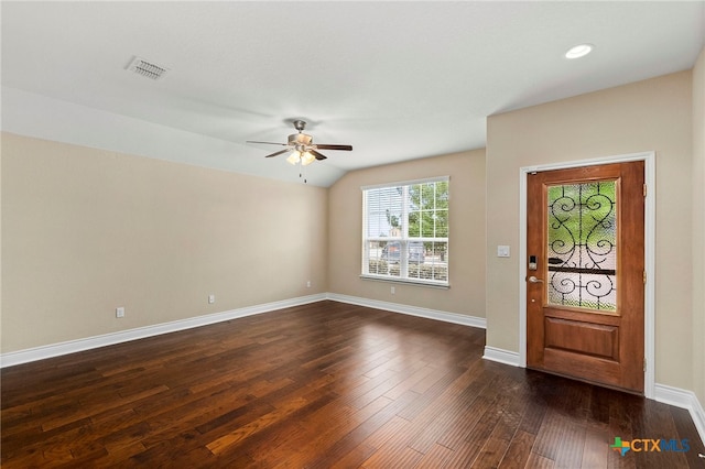 entryway with ceiling fan, dark wood-type flooring, visible vents, baseboards, and lofted ceiling