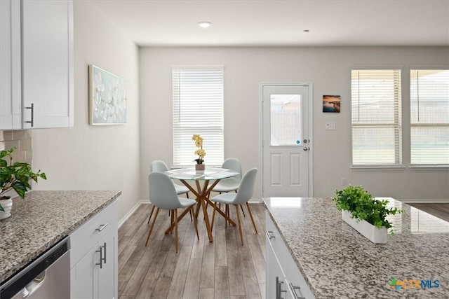 212 Gunther Way, Taylor, TX 76574 - dining space with light wood finished floors and baseboards