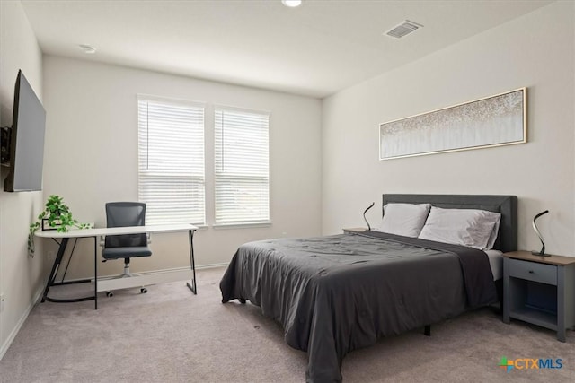212 Gunther Way, Taylor, TX 76574 - carpeted bedroom featuring an office area and baseboards