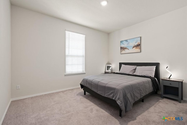 212 Gunther Way, Taylor, TX 76574 - bedroom with carpet flooring, baseboards, and recessed lighting
