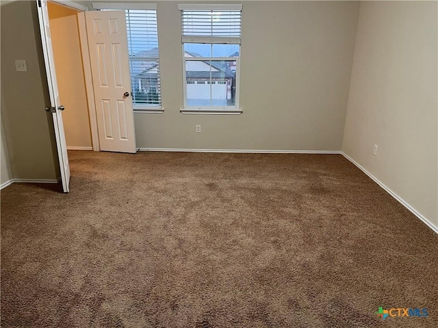 unfurnished bedroom with carpet flooring