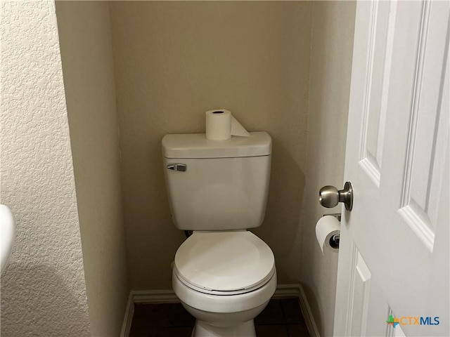 bathroom featuring toilet