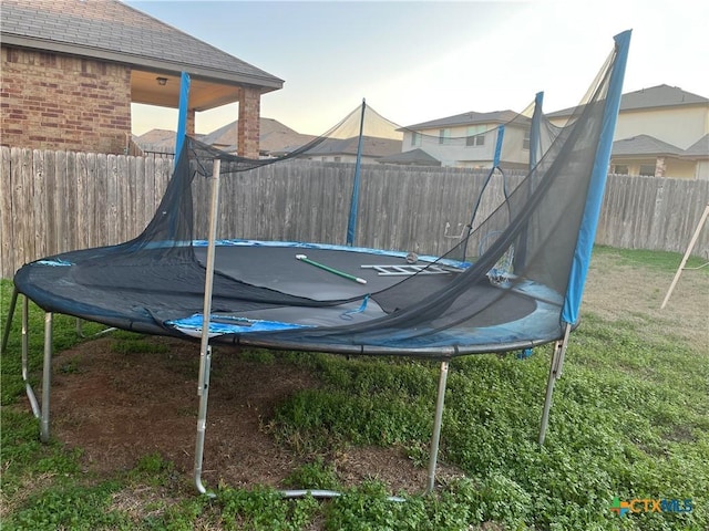 view of yard with a trampoline