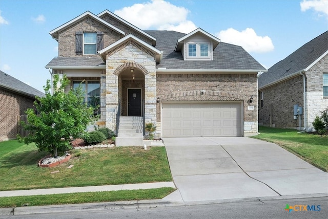 view of front facade featuring a garage and a front yard