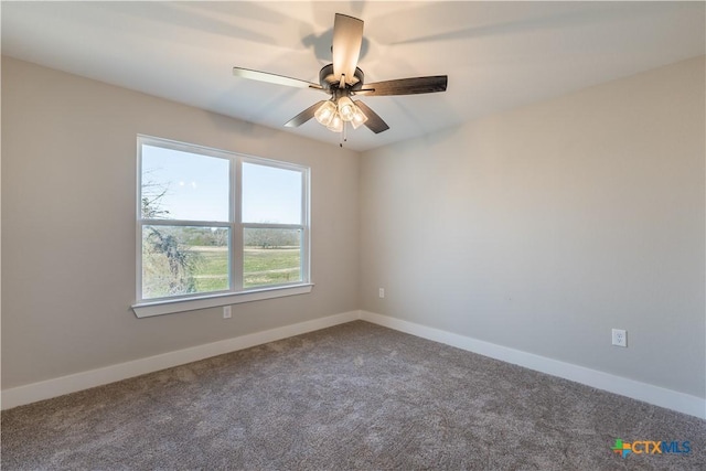 carpeted empty room with ceiling fan