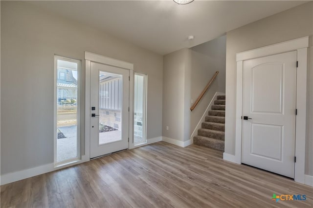 doorway to outside with light hardwood / wood-style flooring