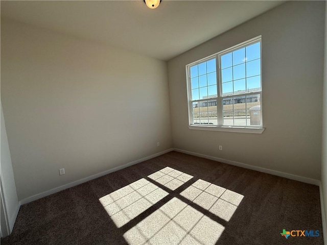 view of carpeted spare room