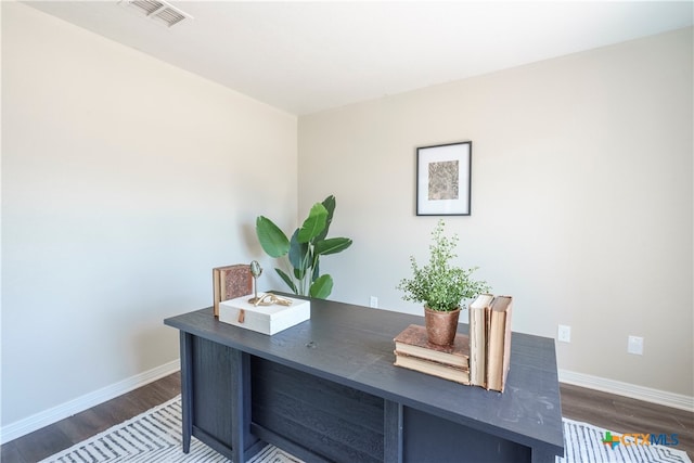 office space featuring dark hardwood / wood-style floors