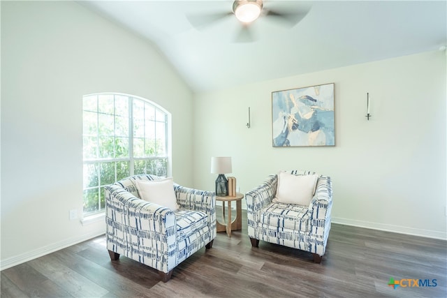 sitting room with dark wood-type flooring, ceiling fan, and lofted ceiling