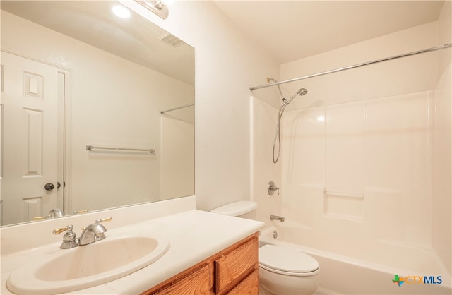 full bathroom with vanity, toilet, and bathtub / shower combination