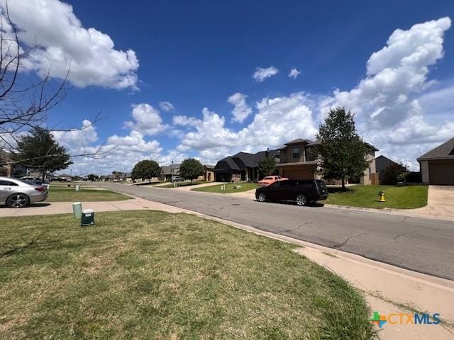 10234 Condor Loop, Waco, TX 76708 - view of asphalt road featuring curbs and a residential view