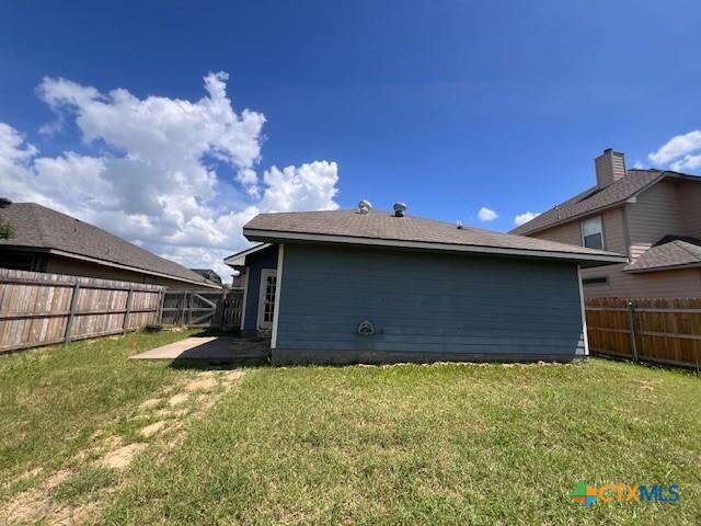 10234 Condor Loop, Waco, TX 76708 - rear view of house featuring a fenced backyard