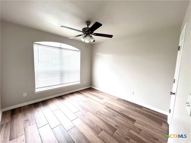 8302 Ridge Crest Dr, Killeen, TX 76542 - spare room with a ceiling fan, baseboards, and wood finished floors