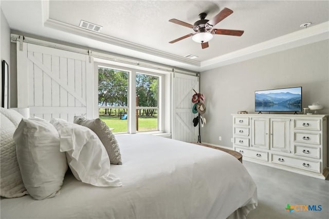 carpeted bedroom featuring a barn door, crown molding, ceiling fan, access to exterior, and visible vents
