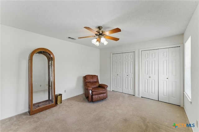 1233 Oakcrest Dr, Pleasanton, TX 78064 - unfurnished room with carpet floors, ceiling fan, and arched walkways
