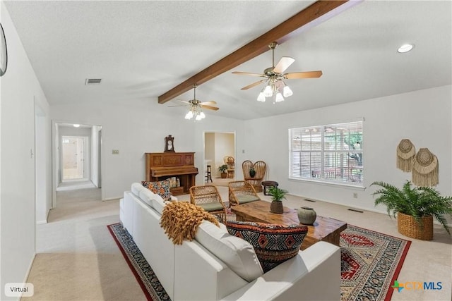 1233 Oakcrest Dr, Pleasanton, TX 78064 - living area with light colored carpet, ceiling fan, and recessed lighting