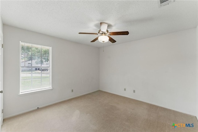 1233 Oakcrest Dr, Pleasanton, TX 78064 - unfurnished room featuring light carpet and ceiling fan