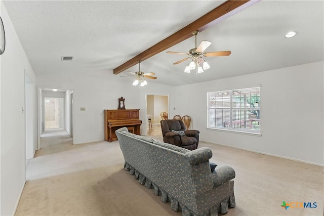 1233 Oakcrest Dr, Pleasanton, TX 78064 - living area with light colored carpet and ceiling fan