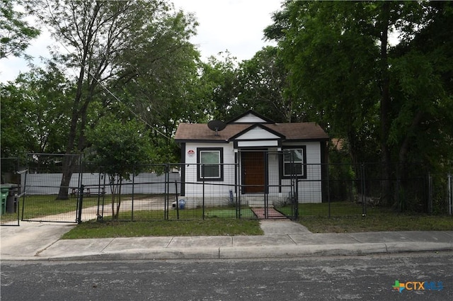 314 Huerta St, San Antonio, TX 78207 - bungalow-style house with a fenced front yard and a gate