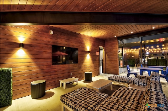 home theater with wood-type flooring, wooden walls, and wooden ceiling