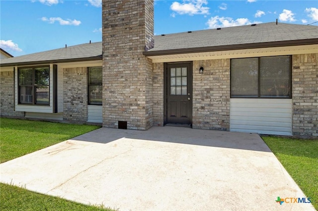 3317 Westrim Dr, Killeen, TX 76549 - entrance to property featuring a chimney, roof with shingles, a lawn, a patio area, and stone siding