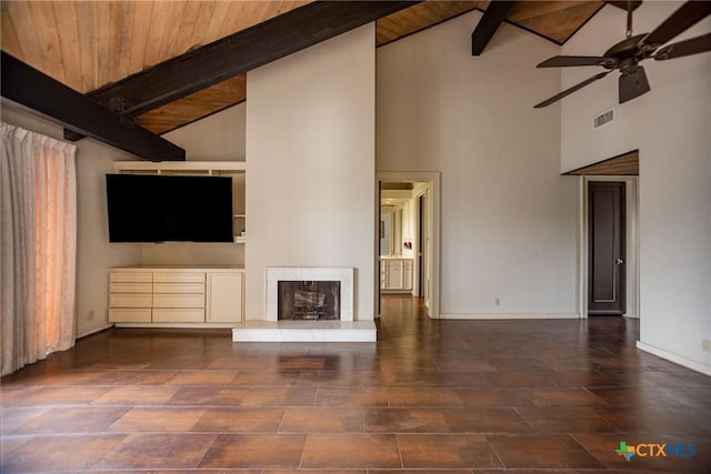 1809 W Harrison Ave, Port Oconnor, TX 77982 - unfurnished living room featuring high vaulted ceiling, a ceiling fan, a fireplace, and a wooden ceiling with exposed beams